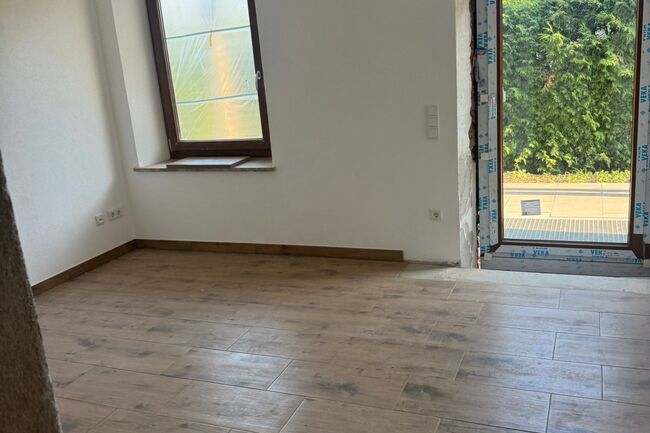 Wohnzimmer mit Terrasse